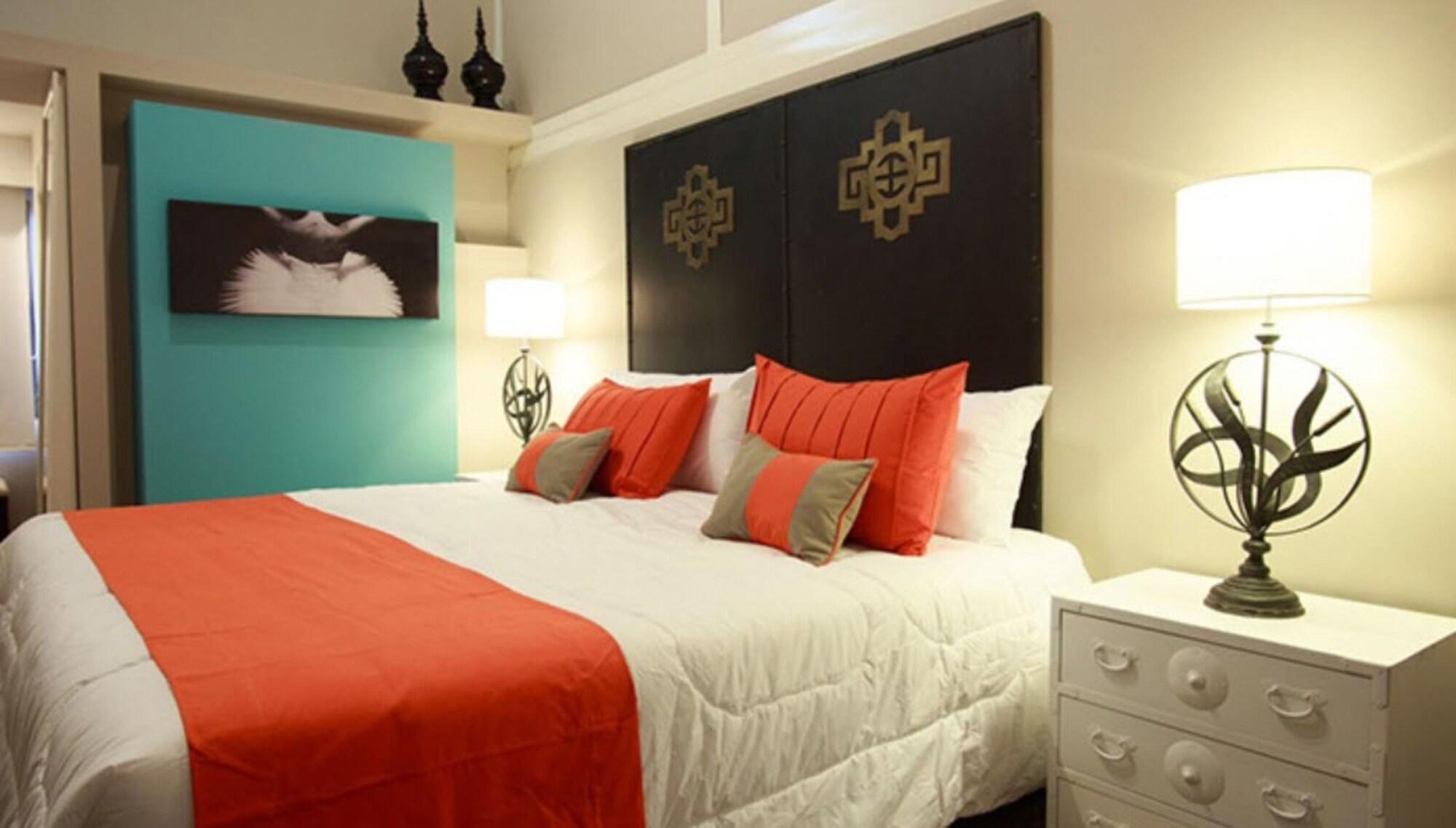 Spa Hotel La Reserve Colonia Del Sacramento Exterior foto A bedroom at the Inn at the Opera
